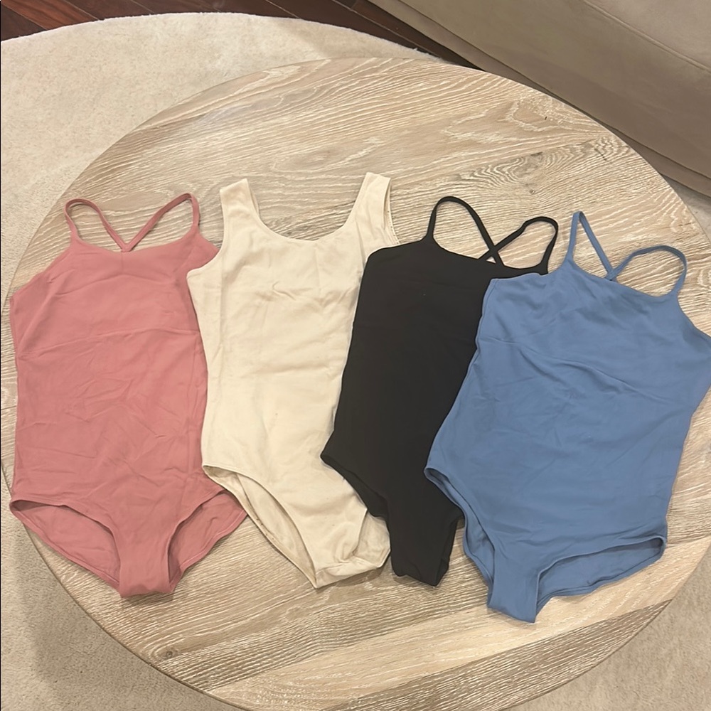 Set of 4: One Piece leotards - Pink, Cream, Black, Blue